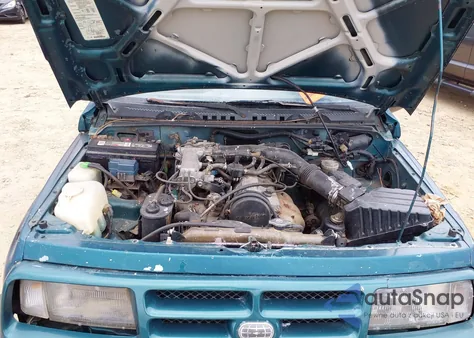 1998 Chevrolet Tracker Base Cmi из США, поврежденный, VIN 2CNBE1865W6925992